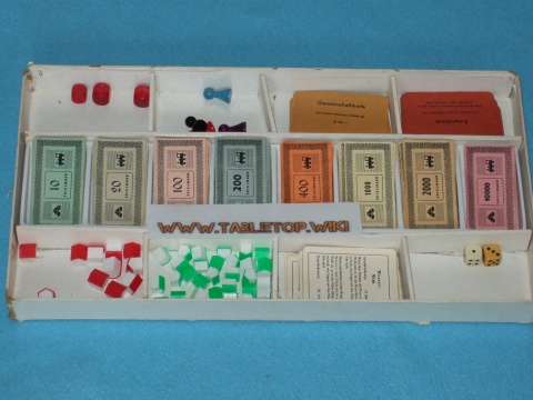 Karten, Häuser, Hotels und Geldscheine